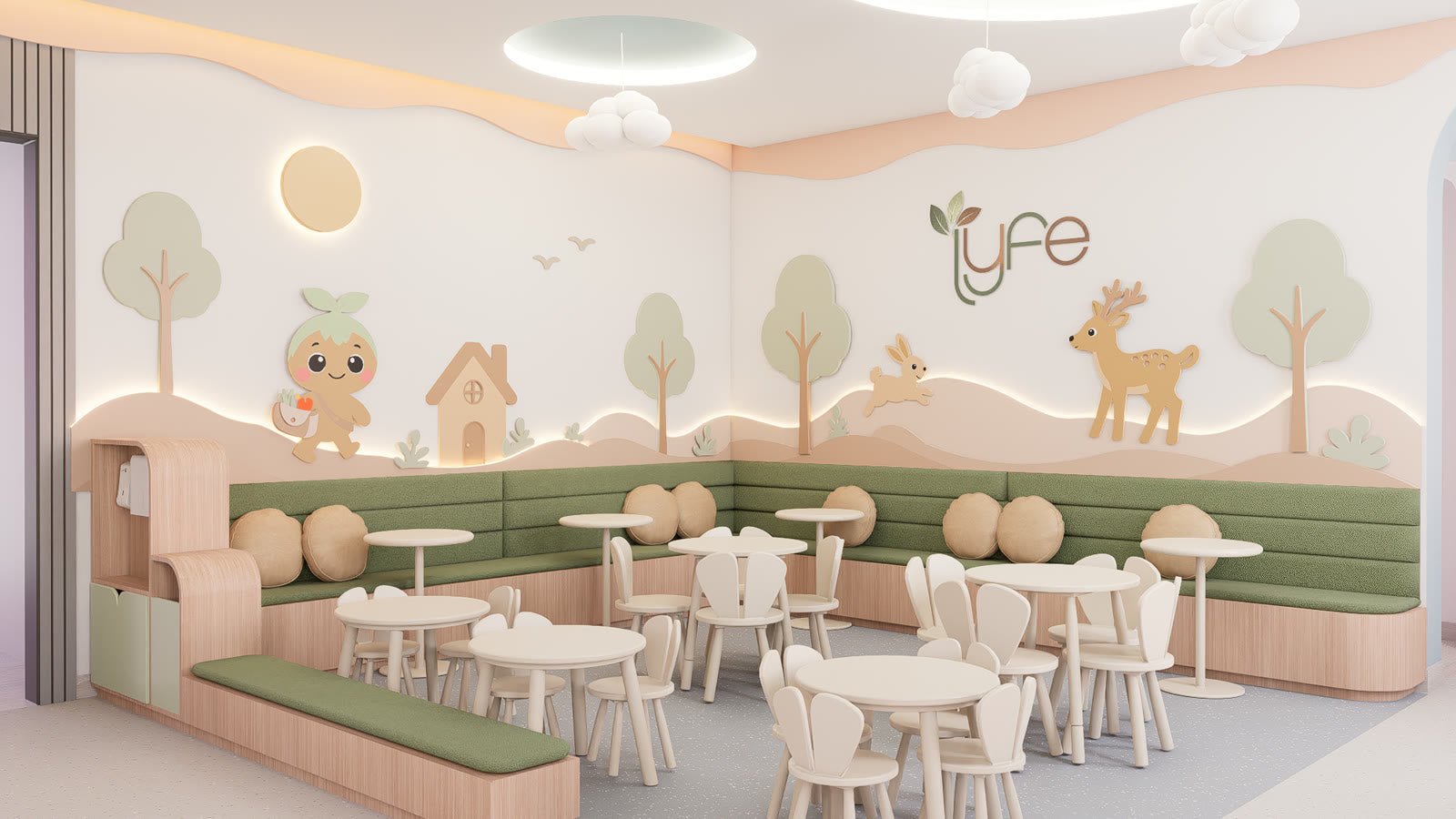 Seating at Lyfe Playhouse: a long green banquette running around two walls, round tables and small chairs with ears, and a wall of cut out trees, a deer, a rabbit and a house with the Lyfe name lit above it.