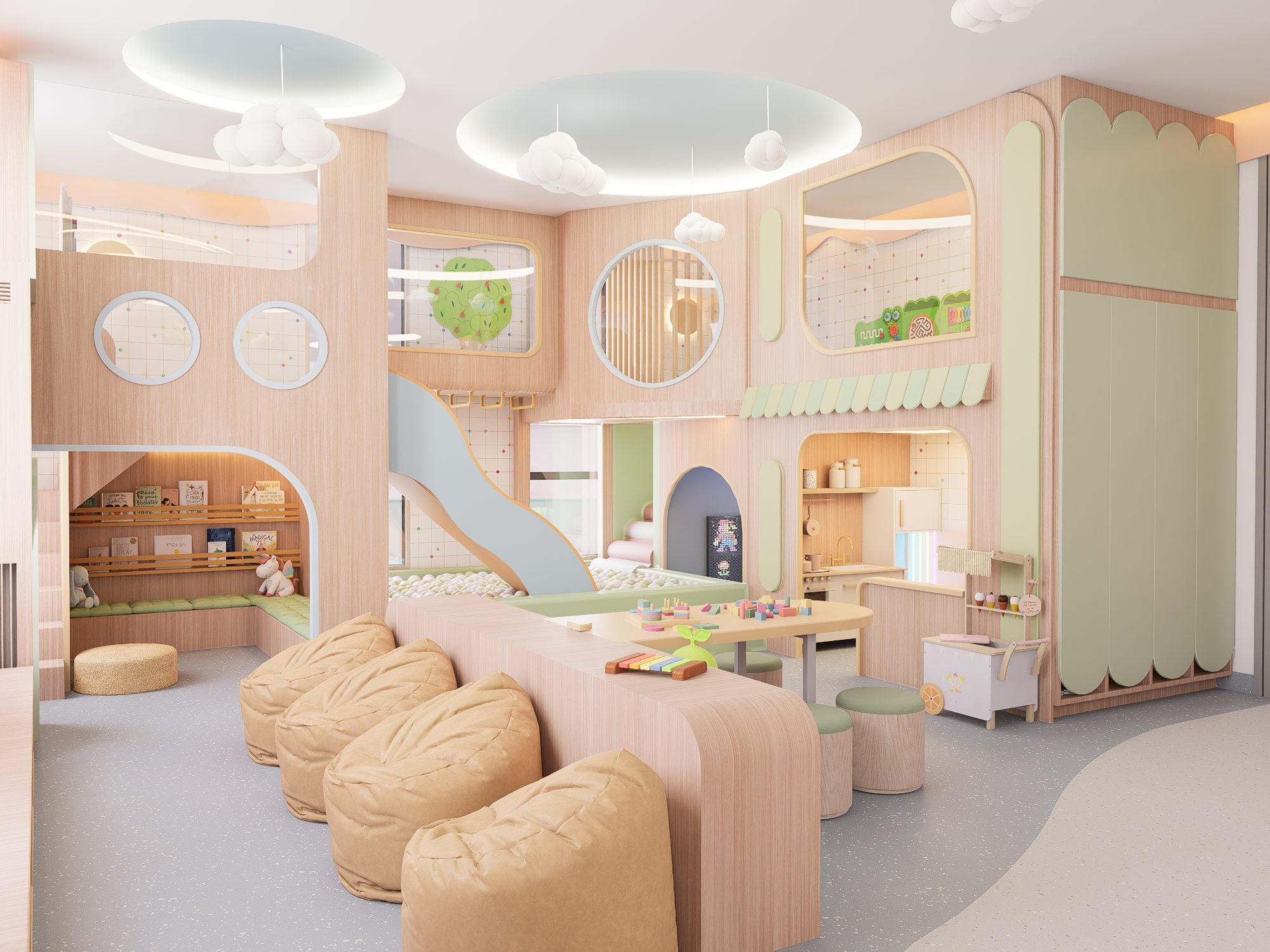 Lyfe Playhouse, a commercial play space with a slide into a ball pit, a reading nook, a play kitchen and bean bag seating